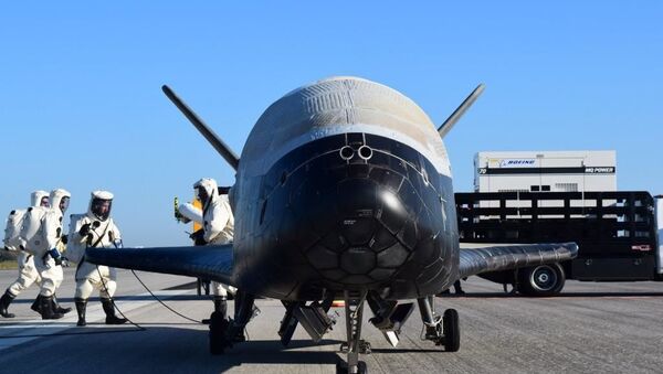 The U.S. Air Force's X-37B Orbital Test Vehicle 4 is seen after at NASA 's Kennedy Space Center Shuttle Landing Facility in Florida May 7, 2017 - Sputnik International