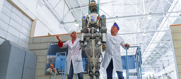 Workers of the Space Corporation Energia remove the anthropomorphic Skybot F-850 robot FEDOR from the Soyuz MS-14 space ship capsule after its return from International Space Station (ISS), in Korolev, outside Moscow, Russia Workers of the Space Corporation Energia remove the anthropomorphic Skybot F-850 robot FEDOR from the Soyuz MS-14 space ship capsule after its return from International Space Station (ISS), in Korolev, outside Moscow, Russia - Sputnik International