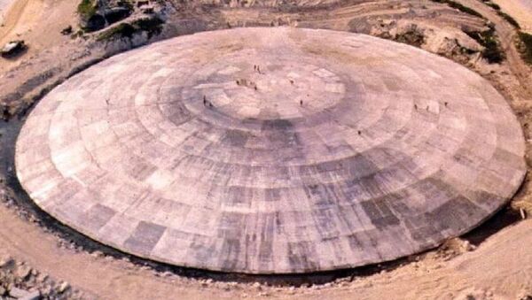 Picture taken by the US Defense Nuclear Agency in 1980, shows the huge dome, which has just been completed over top of a crater left by one of the 43 nuclear blasts on the island, expected to last 25,000 years, capping off radioactive debris from nuclear tests over Runit Island in Enewetak in the Marshall Islands - Sputnik International