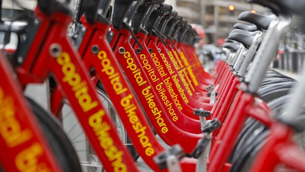 Red bicycles from Capital Bikeshare are seen docked in downtown Washington, Wednesday, Feb. 14, 2018. (AP Photo/Pablo Martinez Monsivais) - Sputnik International