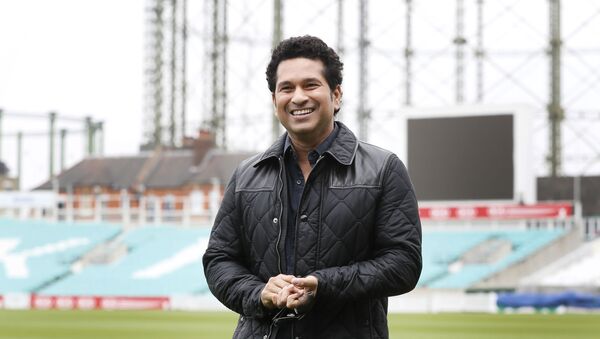 Indian former cricket player Sachin Tendulkar smiles as he walks around the pitch at the Oval cricket ground to promote his upcoming film, in London, Saturday, 6 May 2017 - Sputnik International