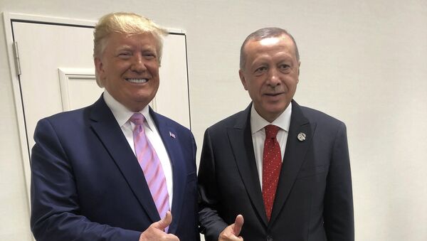 Turkey's President Recep Tayyip Erdogan, right, and U.S President Donald Trump gesture during the G-20 summit in Osaka, Japan, Friday, June 28, 2019 - Sputnik International