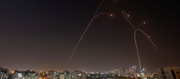 Iron Dome anti-missile system fires interception missiles as rockets are launched from Gaza towards Israel, as seen from the city of Ashkelon, Israel, November 13, 2019 Iron Dome anti-missile system fires interception missiles as rockets are launched from Gaza towards Israel, as seen from the city of Ashkelon, Israel, November 13, 2019 - Sputnik International