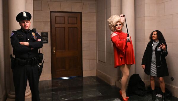 Drag queen Pissi Myles poses in a hallway near the House Intelligence Committee hearing of the impeachment inquiry into U.S. President Donald Trump on Capitol Hill in Washington, U.S., November 13, 2019 - Sputnik International