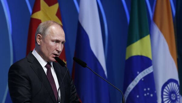Russia's President Vladimir Putin speaks during the BRICS Business Council prior the 11th edition of the BRICS Summit, in Brasilia, Brazil, Wednesday, Nov. 13, 2019 - Sputnik International