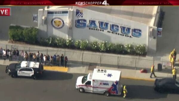 Police and emergency vehicles at Saugus high school in Santa Clarita, California - Sputnik International