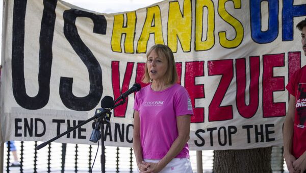 Medea Benjamin, co-founder of CODEPINK, speaks to denounce the recent U.S. sanctions against Venezuela during a protest across from the White House, Thursday, Aug. 8, 2019, in Washington. (AP Photo/Alex Brandon) - Sputnik International