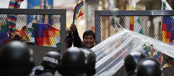 Police block supporters of former President Evo Morales from entering the area of Congress in La Paz, Bolivia, Tuesday, Nov. 12, 2019.  - Sputnik International