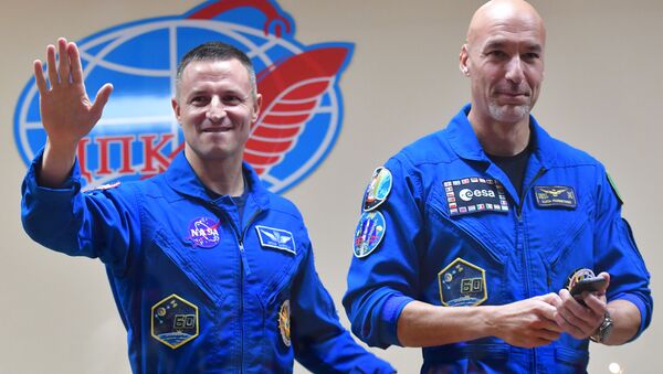 International Space Station (ISS) Expedition 60-61 crew members NASA astronaut Andrew Morgan of the United States and ESA astronaut Luca Parmitano of Italy attend their final news conference ahead of their launch to the ISS at the Baikonur Cosmodrome, Kazakhstan - Sputnik International