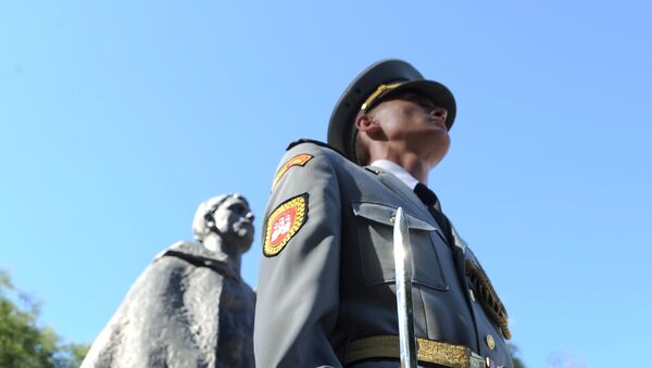 A member of the Slovak honour guard attends a memorial service at Bratislava's 'Slovenske Narodne Povstanie', the Slovak National Uprising memorial and square, on 28 August 2012, during ceremonies commemorating the 68th anniversary of the Slovak National Uprising during World War II. The Slovak National Uprising, also known as the 1944 Uprising, was an armed insurrection organised by the Slovak resistance movement during World War II. It was launched on August 29, 1944 from Bansk - Bystrica in an attempt to overthrow the collaborationist Slovak State of Jozef Tiso.  - Sputnik International