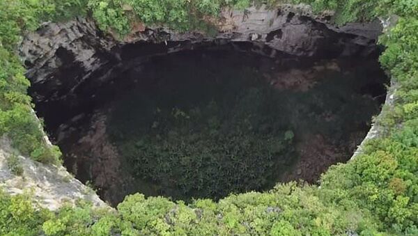 Chinese Scientists Discover Group of 19 Massive Caverns Around Underground River - Sputnik International