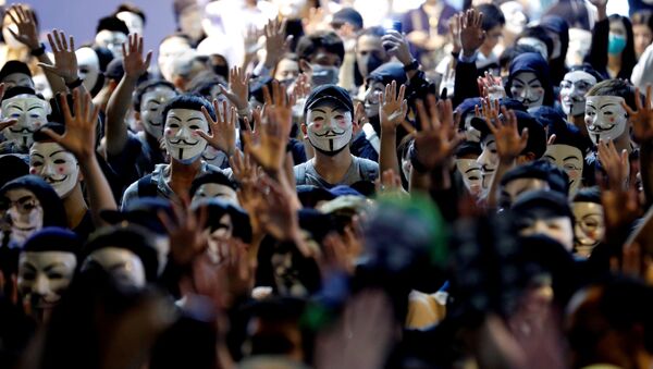 Protesters wearing Guy Fawkes masks attend an anti-government demonstration in Hong Kong, China, November 5, 2019 - Sputnik International