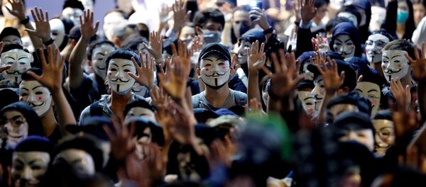 Protesters wearing Guy Fawkes masks attend an anti-government demonstration in Hong Kong, China, November 5, 2019 Protesters wearing Guy Fawkes masks attend an anti-government demonstration in Hong Kong, China, November 5, 2019 - Sputnik International