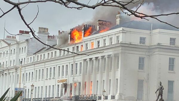 Smoke rises from Claremont Hotel during a fire in Eastbourne, Britain November 22, 2019 in this picture obtained from social media - Sputnik International