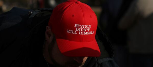 An attendee wears a hat that says Epstein Didn't Kill Himself as militia members and pro-gun rights activists participating in the Declaration of Restoration rally listen to speakers in Washington, D.C., U.S., November 9, 2019 - Sputnik International