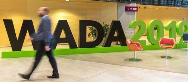A man walks at the World Anti-Doping Agency (WADA) venue on the eve of the Fifth World Conference on Doping in Sport in Katowice, Poland, November 4, 2019. A man walks at the World Anti-Doping Agency (WADA) venue on the eve of the Fifth World Conference on Doping in Sport in Katowice, Poland, November 4, 2019. - Sputnik International
