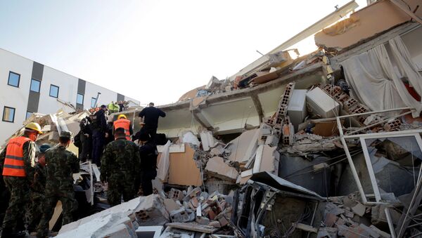 Military and emergency personnel work near a damaged building in Durres, after an earthquake shook Albania, November 26, 2019 - Sputnik International