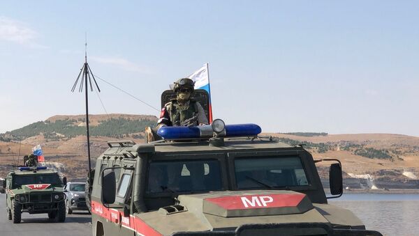 A Russian military police officer near the Euphrates River - Sputnik International