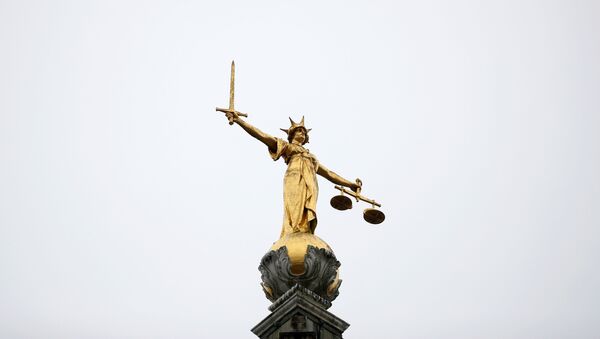 A statue of Lady Justice is seen at Old Bailey central criminal court in London, Britain, November 25, 2019.  - Sputnik International