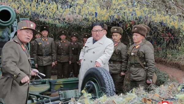 North Korean leader Kim Jong Un visits the Changrindo defensive position on the west front, in this undated picture released by North Korea's Central News Agency (KCNA) on November 25, 2019 - Sputnik International
