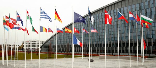 Flags of NATO member countries are seen at the Alliance headquarters in Brussels, Belgium, November 26, 2019. - Sputnik International
