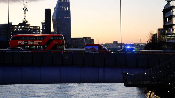 A police vehicle is seen at the site of an incident at London Bridge in London, Britain, November 29, 2019 - Sputnik International