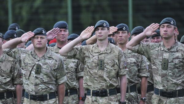 Britain's servicemen attend an opening ceremony for the Rapid Trident/Saber Guardian 2015 military exercises - Sputnik International