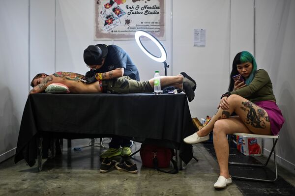 Malaysia Condemns Kuala Lumpur’s Tattoo Exhibition as ‘Porn’, Vows to Take Legal Action - Sputnik International