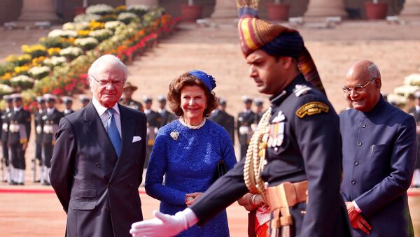 Sweden's King Carl XVI Gustaf, Queen Silvia and India's President Ram Nath Kovind stand during a ceremonial reception at the forecourt of Rashtrapati Bhavan presidential palace in New Delhi, India December 2, 2019 - Sputnik International