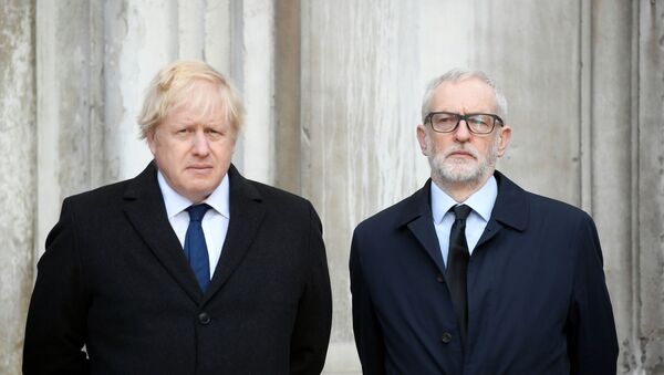 Britain's Prime Minister Boris Johnson and Britain's opposition Labour Party leader Jeremy Corbyn attend a vigil for victims of a fatal attack on London Bridge in London, Britain December 2, 2019 - Sputnik International