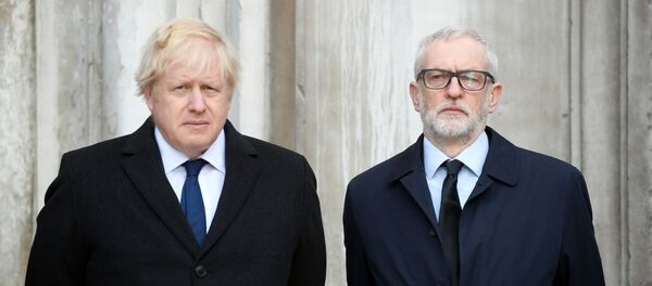 Britain's Prime Minister Boris Johnson and Britain's opposition Labour Party leader Jeremy Corbyn attend a vigil for victims of a fatal attack on London Bridge in London, Britain December 2, 2019 Britain's Prime Minister Boris Johnson and Britain's opposition Labour Party leader Jeremy Corbyn attend a vigil for victims of a fatal attack on London Bridge in London, Britain December 2, 2019 - Sputnik International