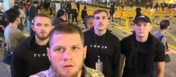 Members of the far-right Ukrainian group Gonor pose during a street protest in Hong Kong - Sputnik International