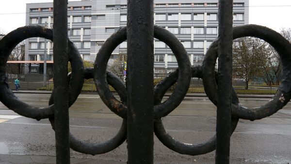 A view through a fence decorated with the Olympic rings shows a building of the federal state budgetary institution which houses a laboratory accredited by the World Anti-Doping Agency (WADA), in Moscow - Sputnik International