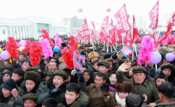 This picture taken on December 2, 2019 and released from North Korea's official Korean Central News Agency (KCNA) on December 3, 2019 shows residents attending a ceremony to mark the completion of the construction of the township of Samjiyon County.  - Sputnik International