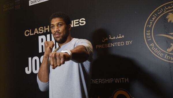 British heavyweight boxing challenger Anthony Joshua arrives for a press conference in the Saudi capital Riyadh on December 2, 2019, ahead of the upcoming Clash on the Dunes. - Sputnik International