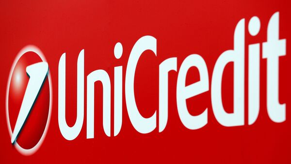 FILE PHOTO: Unicredit bank logo is seen on a banner downtown Milan, Italy, May 23, 2016 - Sputnik International