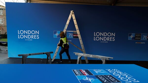 Workers prepare the 'welcome centre' prior to the NATO alliance summit, at The Grove Hotel in Watford, south-east England on 3 December 2019.  - Sputnik International