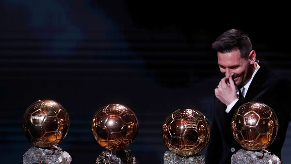 December 2, 2019  Barcelona's Lionel Messi with his Ballon d'Or trophies - Sputnik International