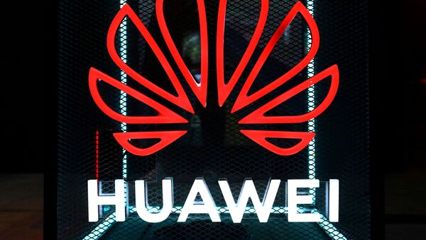 FILE PHOTO: The Huawei logo is pictured at the IFA consumer tech fair in Berlin, Germany, September 5, 2019. - Sputnik International