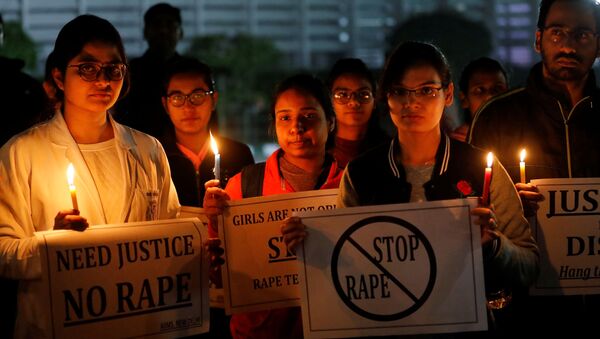 Resident doctors and medical students from All India Institute Of Medical Sciences (AIIMS) attend a candle-lit march to protest against the alleged rape and murder of a 27-year-old woman on the outskirts of Hyderabad, in New Delhi, India, December 3, 2019 - Sputnik International