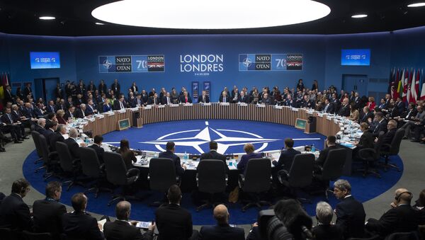 NATO Secretary General Jens Stoltenberg makes an opening statement during a plenary session at the NATO summit at The Grove, Wednesday, Dec. 4, 2019, in Watford, England - Sputnik International