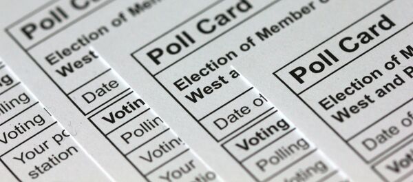 A photograph taken in London on November 14, 2019 shows polling cards for the 2019 UK general election arranged as an illustration. A photograph taken in London on November 14, 2019 shows polling cards for the 2019 UK general election arranged as an illustration. - Sputnik International