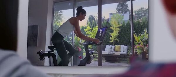 An actor is pictured in this screengrab from The Gift That Gives Back exercise bike commercial by Peloton obtained December 4, 2019. An actor is pictured in this screengrab from The Gift That Gives Back exercise bike commercial by Peloton obtained December 4, 2019. - Sputnik International