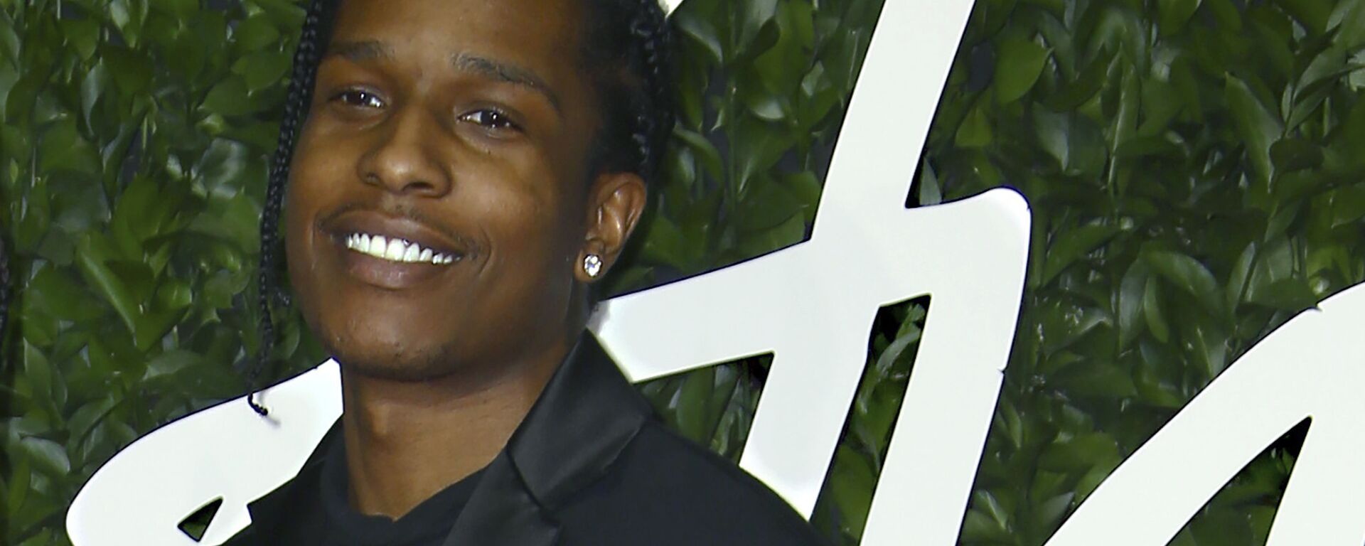 n this file photo dated Monday, Dec. 2, 2019, ASAP Rocky poses for photographers upon arrival at the British Fashion Awards in central London.  - Sputnik International, 1920, 16.08.2022