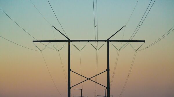 Electrical power lines along Great River Road near Trempealeau, Wisconsin, at sunset - Sputnik International