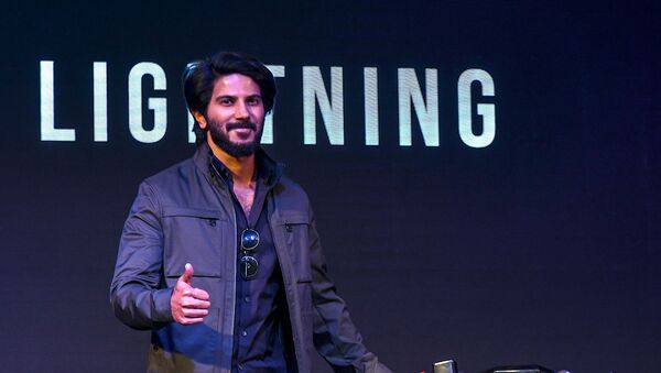 Bollywood actor and promoter of the startup Ultraviolette Automotive Private Limited, Dulquer Salmaan poses for a photograph during the unveiling of F77, India's first high performance electric motorcycle designed and developed by the company, in Bangalore on November 13, 2019 - Sputnik International
