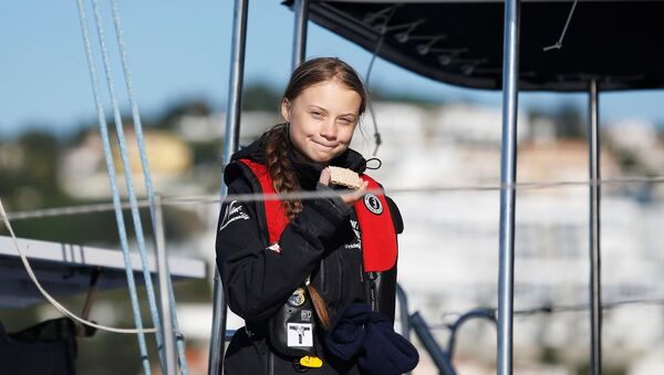 Climate change activist Greta Thunberg arrives aboard the yacht La Vagabonde at Santo Amaro port in Lisbon, Portugal December 3, 2019 - Sputnik International