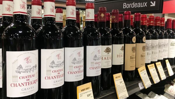 Bottles of French wine are displayed for sale in a liquor store on December 3, 2019 in Arlington, Virginia. - Sputnik International