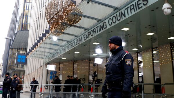 Journalists and police officers stand outside the Organisation of the Petroleum Exporting Countries (OPEC) headquarters in Vienna, Austria December 5, 2019.  - Sputnik International