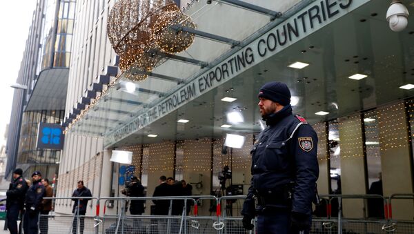 Journalists and police officers stand outside the Organisation of the Petroleum Exporting Countries (OPEC) headquarters in Vienna, Austria December 5, 2019 - Sputnik International